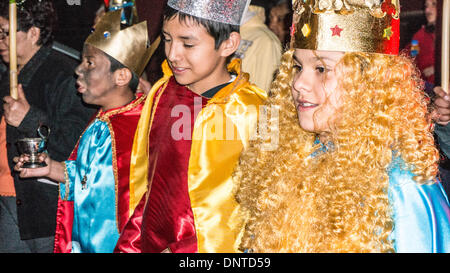 Oaxaca, Mexico, 5th January 2014: gorgeously costumed, the Three Kings preceded by the Virgin Mary carrying the infant Christ child, parade through the night streets of Barrio Trinidad de las Huertas on the eve of Three Kings Day in a children´s re-enactment of the Adoration of the Magi Credit:  Dorothy Alexander/Alamy Live News Stock Photo