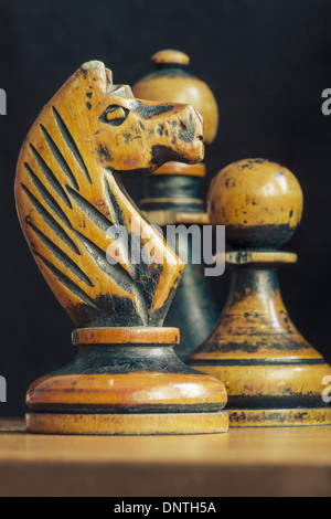 vintage chess figures closeup with focus on knight Stock Photo