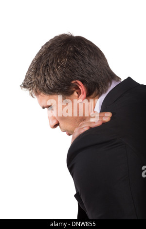Businessman suffering from shoulder pain Stock Photo