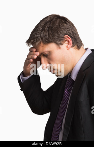 Close-up side view of a worried businessman Stock Photo