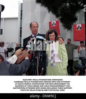 July 3, 2001 - K22314MR: PAULA POUNDSTONE ARRAIGNED.COMEDIAN PAULA POUNDSTONE ARRIVES WITH HER ATTORNEY  .AT SANTA MONICA COURTHOUSE FOR HER ARRAIGNMENT ON .CHARGES OF CHILD ABUSE AND CHILD ENDANGERMENT 7/3/01.SUPPORTERS ATTENDED WITH SIGNS DECLARING THEIR SUPPORT.. MILAN RYBA/   2001(Credit Image: © Globe Photos/ZUMAPRESS.com) Stock Photo