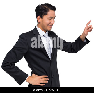 Smiling asian businessman pointing Stock Photo