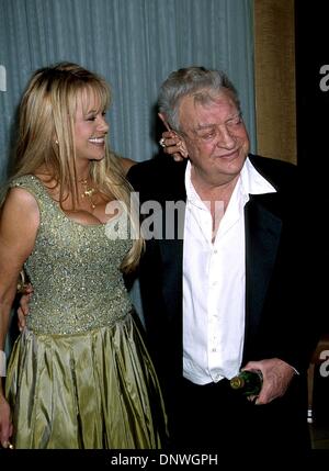 Rodney Dangerfield and wife Joan Child arriving at the Mentor of the Year  at the Beverly Hilton in Los Angeles. March 21, 2002. - DangerfieldRodney  ChildJ03.JPG - DangerfieldRodney ChildJ03.JPGDangerfieldRodney ChildJ03  Event in