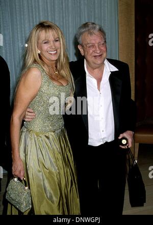 Rodney Dangerfield and wife Joan Child arriving at the Mentor of the Year  at the Beverly Hilton in Los Angeles. March 21, 2002. - DangerfieldRodney  ChildJ03.JPG - DangerfieldRodney ChildJ03.JPGDangerfieldRodney ChildJ03  Event in