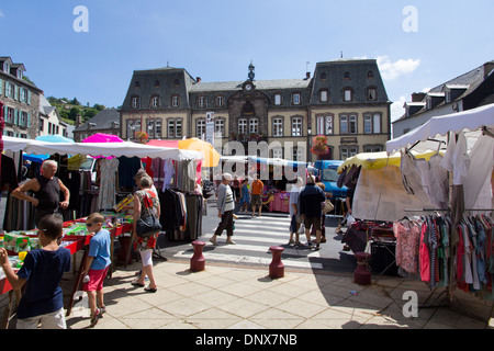 Murat, Cantal, Auvergne, France - 9 Aug 2013: A street market scene in front of the town hall Stock Photo