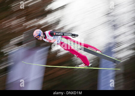 Bischofshofen, Austria. 06th Jan, 2014. German ski jumper Michael Neumayer in action during a training session for the fourth stage of the Four Hills ski jumping tournament in Bischofshofen, Austria, 06 January 2014. Photo: DANIEL KARMANN/dpa/Alamy Live News Stock Photo