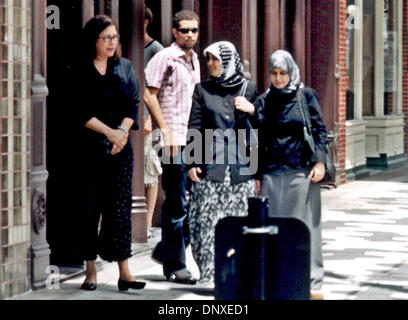 Dec 07, 2005; Ybor City, FL, USA; (File Photo) Tampa attorney Linda Moreno (left) with the family of former University of South Florida professor Dr. Sami Al-Arian who is being held at the United  States Prison at Coleman and charges that he raised money for terrorists. Al-Arian's oldest son, Abdullah (left center), wife/mother Nahla (right center) and daughter Laila  leave Moreno' Stock Photo