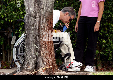 Dec 07, 2005; West Palm Beach, FL, USA; Don Chester, with occupational therapist Leigh Ann Agee, takes a break while exercising on a non-motorized wheel chair near his home in West Palm Beach. Don, a triathlete was paralyzed after being struck by a car while training Dec. 24, 2004. Always the athlete he is constantly pushing himself to get stronger. Mandatory Credit: Photo by Gary  Stock Photo