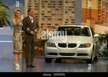 Dec 10, 2005; Ft. Lauderdale, FL, USA; Wheel of Fortune co-hosts Vanna White, left, and Pat Sajak greet the audience as they tape the show's 'Fun In The Sun' segments at the Broward County Convention Center in Ft. Lauderdale Saturday, Dec. 10, 2005. Shows from the Ft. Lauderdale taping will air in mid-February.  Mandatory Credit: Photo by Chris Matula/Palm Beach Post /ZUMA Press. ( Stock Photo