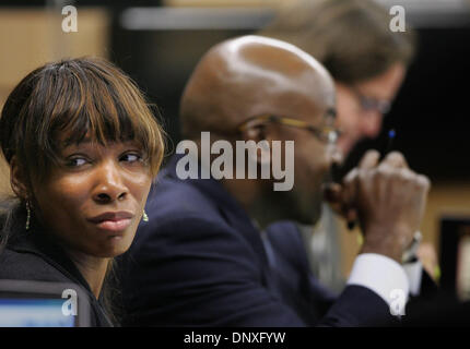 Dec 12, 2005; West Palm Beach, FL, USA; Venus Williams at the defense table with attorney F. Malcolm Cunningham testifies in Judge Jeffrey Winikoff's courtroom Monday. The Williams sisters and their father are defendants in a lawsuit contending that Richard Williams committed them to playing in the proposed 'Battle of the Sexes' tournament. The lawsuit, seeking unspecified damages, Stock Photo