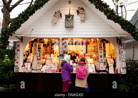 Christmas Market Cologne - customers at a stall in the Newmarkt or Angels market, Cologne ( Koln ), Germany Europe Stock Photo