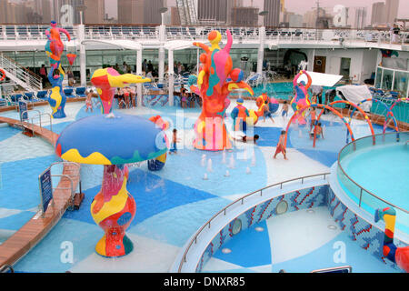 May 26, 2006 - Miami, Florida, USA - Kids pool area on the largest ship at sea. MS Freedom of the Seas is a cruise ship owned and operated by Royal Caribbean International. It is the namesake of Royal Caribbean's Freedom Class of cruise ships, and can accommodate over 4,300 passengers and 1,300 crew on fifteen passenger decks. In addition to two sister ships, Freedom will keep the  Stock Photo