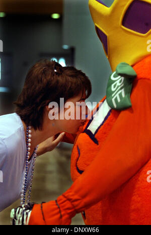 Jan 02, 2006; Miami Beach, FL, USA; LISA SCHELL kisses 'Obie,' the official mascot in hopes of a Penn State FedEx Orange Bowl victory during a pep rally at the Miami Beach Convention Center on Jan. 2, 2005. Penn State boasts the largest alumni organization in the country and thousands of the party faithful flocked to the convention center to see the team, hear the Blue Band and scr Stock Photo