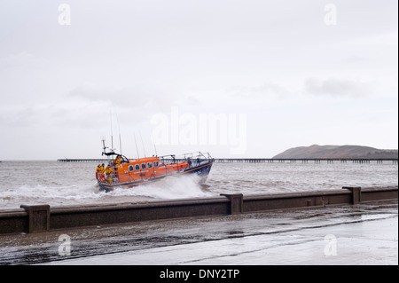 Ramsey, Isle of Man - RNLB Mersey-class relief Lifeboat Royal Shipwright at sea during an exceptionally high tide. Stock Photo