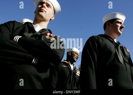 Jan 14, 2006; Ingleside, TX, USA; Crew members of the USS San Antonio Edmund Debit (from left), Tory Evans, and Joseph Lyles, await the beginning of the ship's commissioning ceremony at Naval Station Ingleside. Mandatory Credit: Photo by Mike Kane/San Antonio Express-News/ZUMA Press. (©) Copyright 2006 by San Antonio Express-News Stock Photo