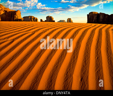 Sand dunes and monoliths, Monument Valley Tribal Park, Arizona Stock Photo