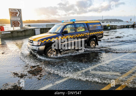 Portaferry, Northern Ireland. 6 Jan 2014 - A coastguard vehicle drives through seawater which has flooded the main road in Portaferry, Northern Ireland. The town was at risk of severe flooding caused by the high tides and the stormy weather. Credit:  Stephen Barnes/Alamy Live News Stock Photo