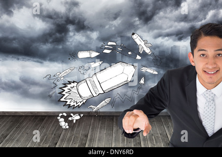 Composite image of smiling asian businessman pointing Stock Photo