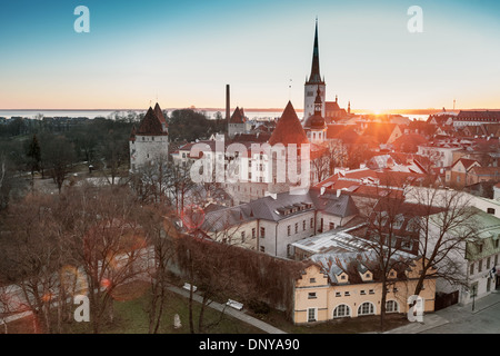 Early morning cityscape with rising sun light in old town of Tallinn, Estonia Stock Photo