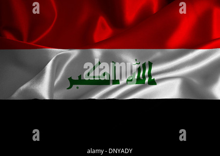 Iraq flag on satin texture. Stock Photo