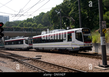 A  car  Mass Transit Rail tram in the new territories town of Tuen Mun, Hong Kong Stock Photo