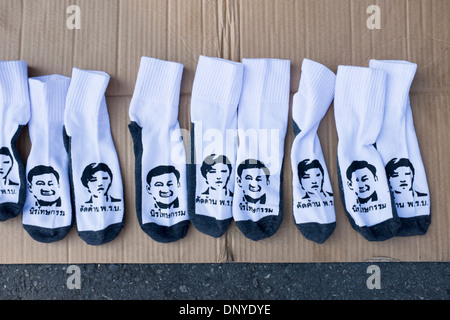 Anti Government Protestors street stall selling socks featuring the faces of former Prime Minister Thaksin and his Sister 2013 Stock Photo