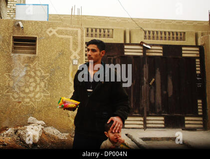 Feb 20, 2006; Fallujah, IRAQ; Street scenes of the Iraqi city of Al-Falujah, pictured throughout January and February, 2006. The broken city fights to survive as insurgents and soldiers fight to destroy. Mandatory Credit: Photo by Toby Morris/ZUMA Press. (©) Copyright 2006 by Toby Morris Stock Photo