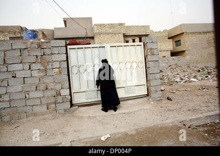 Feb 20, 2006; Fallujah, IRAQ; Street scenes of the Iraqi city of Al-Falujah, pictured throughout January and February, 2006. The broken city fights to survive as insurgents and soldiers fight to destroy. Mandatory Credit: Photo by Toby Morris/ZUMA Press. (©) Copyright 2006 by Toby Morris Stock Photo