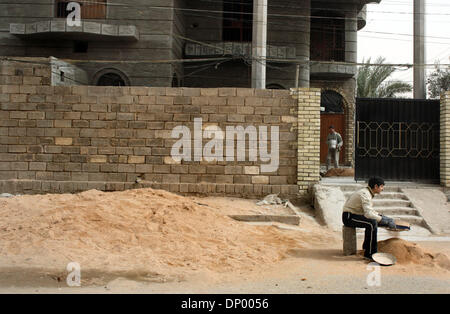 Feb 20, 2006; Fallujah, IRAQ; Street scenes of the Iraqi city of Al-Falujah, pictured throughout January and February, 2006. The broken city fights to survive as insurgents and soldiers fight to destroy. Mandatory Credit: Photo by Toby Morris/ZUMA Press. (©) Copyright 2006 by Toby Morris Stock Photo