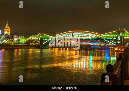 Bogdan Khmelnitsky bridge at night in Moscow. The beautiful pedestrian bridge across the Moscow River. Stock Photo