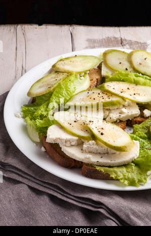 Sandwich with cottage cheese and pickled cucumber Stock Photo