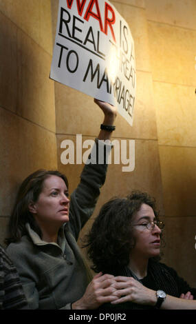 Mar 23, 2006; St. Paul, MN, USA; Nan Blomquist and partner Lisa Miller of St. Louis Park support OutFront Minnesota at a rally for people of different religious backgrounds to speak against a possible gay marriage constitutional amendment at the State Capitol rotunda in St. Paul, MN, Thursday, March 23, 2006.  Speakers included Reverend Doug Donley of University Baptist Church and  Stock Photo