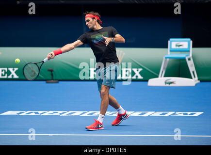 Melbourne, Australia. 7th Jan, 2014. Roger Federer of Switzerland attends a training session ahead of the 2014 Australian Open at Rod Laver Arena in Melbourne, Australia, Jan. 7, 2014. Credit:  Bai Xue/Xinhua/Alamy Live News Stock Photo