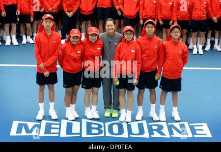 Melbourne, Australia. 7th Jan, 2014. Li Na (C) of China poses for photos with Chinese ball kids at Rod Laver Arena in Melbourne, Australia, Jan. 7, 2014. Credit:  Tennis Australia/Xinhua/Alamy Live News Stock Photo