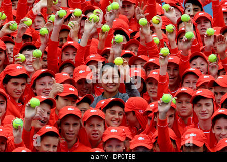 Melbourne, Australia. 7th Jan, 2014. Li Na of China poses for photos with ball kids at Rod Laver Arena in Melbourne, Australia, Jan. 7, 2014. Credit:  Tennis Australia/Xinhua/Alamy Live News Stock Photo