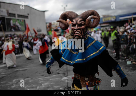 Pasto, Colombia. 6th Jan, 2014. An artist participates in the 'Great Parade Magno' in the city of Pasto, Colombia, on Jan. 6, 2014. Emblematic floats are presented in the 'Great Parade Magno' ending the Carnival of Blacks and Whites, one of the main celebrations of Colombia, declared as Intangible Cultural Heritage of Humanity by the committee of the United Nations Education, Science and Culture Organization (UNESCO) in 2009. Credit:  Jhon Paz/Xinhua/Alamy Live News Stock Photo