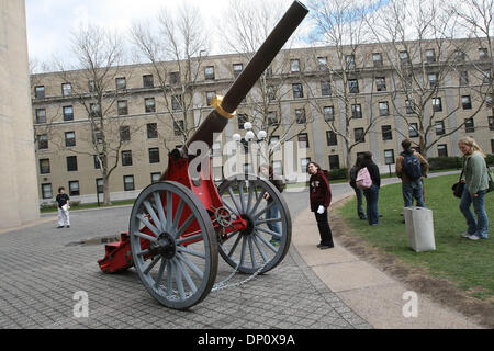 Apr 06, 2006; Cambridge, MA, USA; The Battle of the Techies continues. MIT students surround a Spanish-American War cannon that had originally been in Pasadena, CA at Caltech and was recently moved to the MIT campus in Cambridge, MA. With one addition, a replica of a 2006 MIT class ring affectionately known as a 'Brass Rat' Mandatory Credit: Photo by Bethany Versoy/ZUMA Press. (©)  Stock Photo