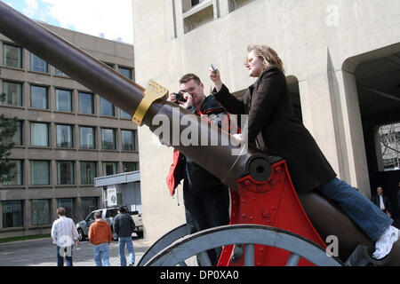 Apr 06, 2006; Cambridge, MA, USA; The Battle of the Techies continues. MIT students surround a Spanish-American War cannon that had originally been in Pasadena, CA at Caltech and was recently moved to the MIT campus in Cambridge, MA. With one addition, a replica of a 2006 MIT class ring affectionately known as a 'Brass Rat' Mandatory Credit: Photo by Bethany Versoy/ZUMA Press. (©)  Stock Photo