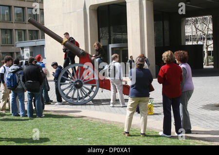 Apr 06, 2006; Cambridge, MA, USA; The Battle of the Techies continues. MIT students surround a Spanish-American War cannon that had originally been in Pasadena, CA at Caltech and was recently moved to the MIT campus in Cambridge, MA. With one addition, a replica of a 2006 MIT class ring affectionately known as a 'Brass Rat' Mandatory Credit: Photo by Bethany Versoy/ZUMA Press. (©)  Stock Photo