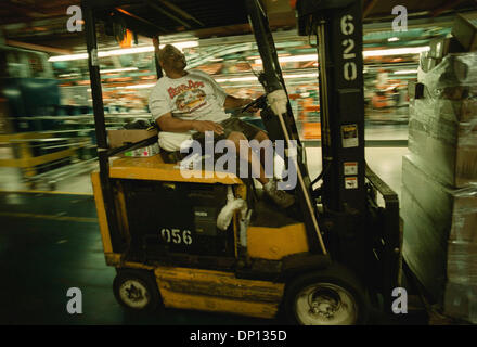 Apr 13, 2006; Detroit, MI, USA; (FILE PHOTO: Exact date 07-29-2001) DaimlerChrysler to Sell Manufacturing Assets from Sterling Heights Assembly Plant. Pictured: Gordon Wald, called the 'whistler,' always whistling, high-low driver, delivers parts along the line at the Sterling Heights (Michigan) Assembly Plant during the 2001 model year start-up for the Dodge Stratus and Chrysler S Stock Photo