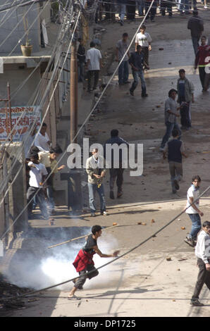 Apr 22, 2006; Kathmandu, NEPAL; Demonstration time in Nepal: Seven opposition democratic parties and anti-monarchy protesters were defying the curfew order of the government to restore a democratic republic in Nepal. During this movement 15 people were killed by security personnel and hundreds of people were badly injured. King Gyanendra addressed the people trying to undo his 1 Fe Stock Photo