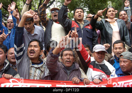 Apr 22, 2006; Kathmandu, NEPAL; Demonstration time in Nepal: Seven opposition democratic parties and anti-monarchy protesters were defying the curfew order of the government to restore a democratic republic in Nepal. During this movement 15 people were killed by security personnel and hundreds of people were badly injured. King Gyanendra addressed the people trying to undo his 1 Fe Stock Photo