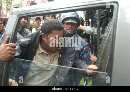 Apr 22, 2006; Kathmandu, NEPAL; Demonstration time in Nepal: Seven opposition democratic parties and anti-monarchy protesters were defying the curfew order of the government to restore a democratic republic in Nepal. During this movement 15 people were killed by security personnel and hundreds of people were badly injured. King Gyanendra addressed the people trying to undo his 1 Fe Stock Photo