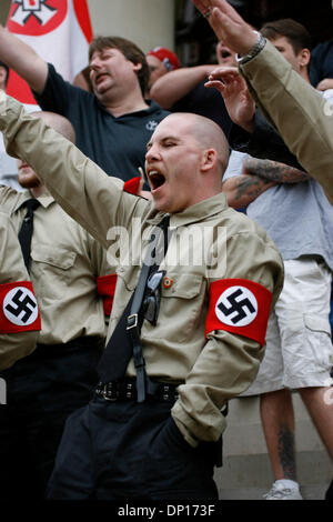 Apr 22, 2006; Lansing, MI, USA; The National Socialist Movement, a Neo-Nazi group, rallies in Lansing. Michigan, protesting against illegal immigrants which have allegedly contributed to dramatic job losses in the state.  Security was very high with the Nazi group being bussed in from a remote location under heavy police escort.  Some anti-racism protesters threatened to kill the N