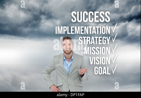 Composite image of stylish man smiling and gesturing Stock Photo