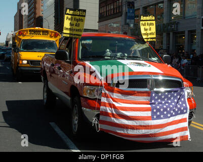May 01, 2006; Manhattan, NY, USA; NY PAPERS OUT. A flagged draped pick up truck crosses 14th St. as tens of thousands of people turn out for the May 1 Great American Boycott and Immigration Rights Rally at Union Square Park to protest proposed legislation to reform U.S. immigration law. Mandatory Credit: Photo by Bryan Smith/ZUMA Press. (©) Copyright 2006 by Bryan Smith Stock Photo