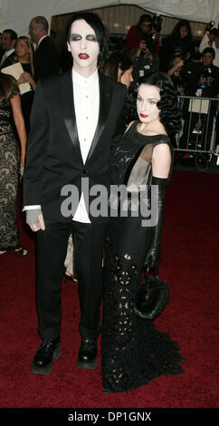 May 01, 2006; New York, NY, USA; MARILYN MANSON and DITA VON TEESE at the arrivals for the Costume Institute Gala 'AngloMania:Tradition and Transgression in British Fashion' held at the Metropolitan Museum of Art. Mandatory Credit: Photo by Nancy Kaszerman/ZUMA Press. (©) Copyright 2006 by Nancy Kaszerman Stock Photo