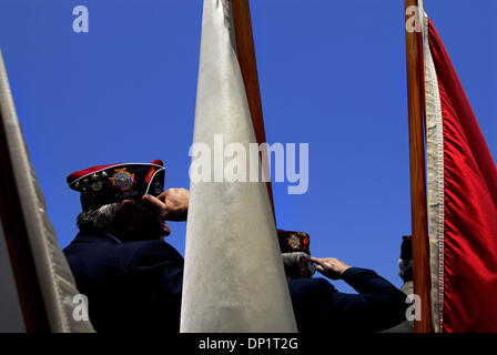 May 07, 2006; Hobe Sound, FL, USA; Roland Witt, (left), commander of VFW Post 10132, salutes during the parade of colors with fellow guest speakers at Sunday's 38th Annual Loyalty Day at VFW Hall-Bryan Post 10132 in Hobe Sound.  Martin County Commissioner Lee Weberman, among other guest speakers, was on hand to receive an award and speak to the local halls.  Mandatory Credit: Photo Stock Photo