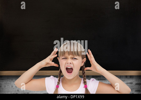Composite image of crazy little girl Stock Photo