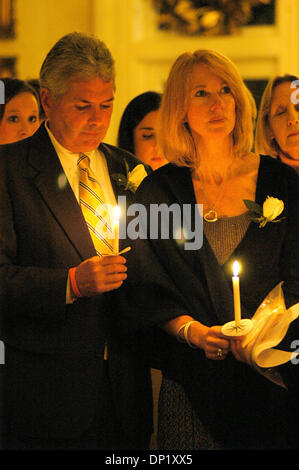 Dec. 08, 2005 - Montgomery, Alabama, U.S. - A candlelight vigil was held for missing persons from Alabama, including missing teen, Natalee Holloway who was on vacation in Aruba when she disappeared. Holloway's friends and family attended the vigil at the Alabama Governor's mansion with Governor Bob Riley and his wife, Patsy, in Montgomery, Ala. Here, Natalee's mother, Beth, and ste Stock Photo